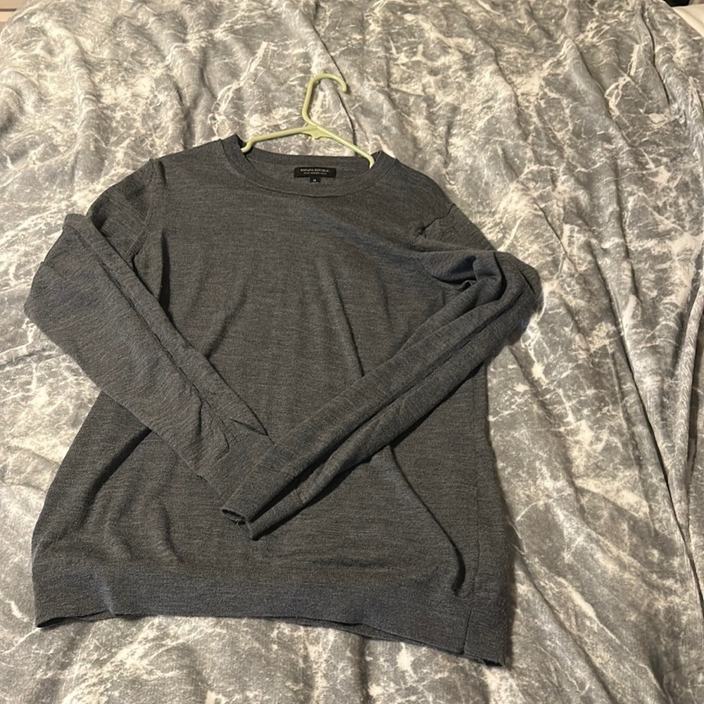 This shirt has been worn twice and is still excellent condition!